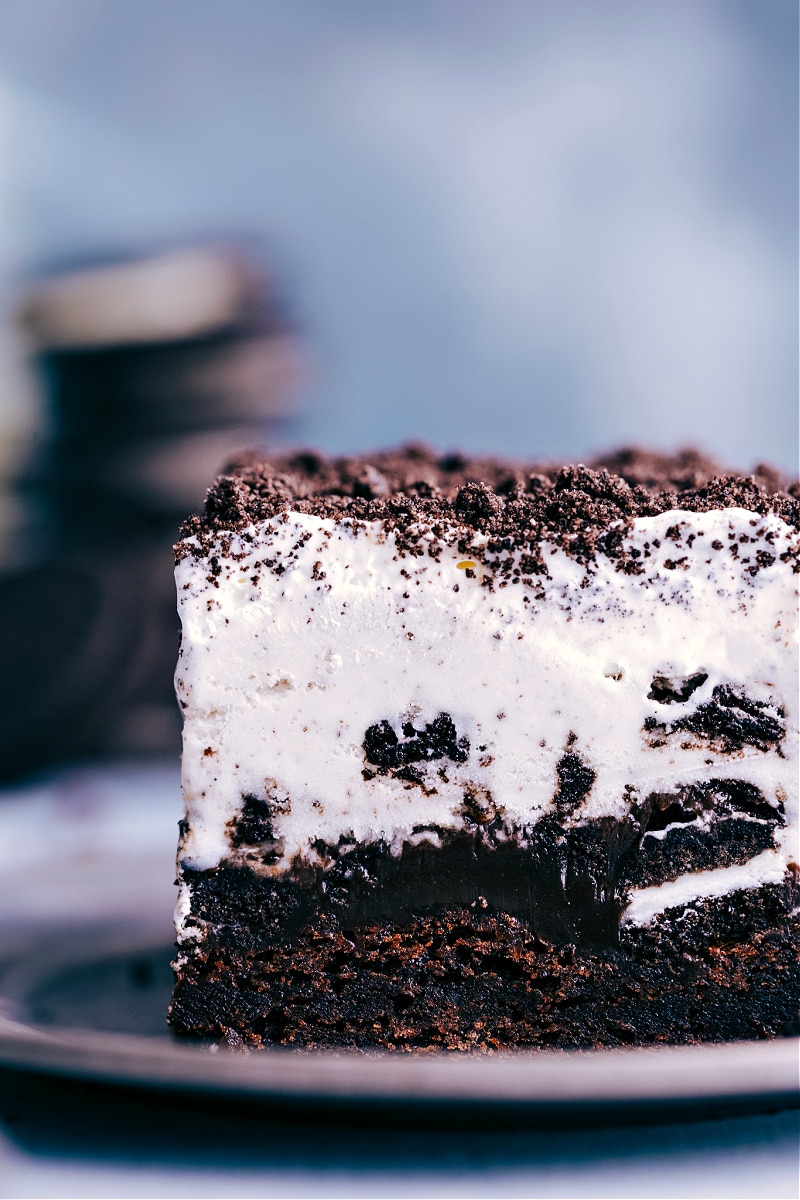 Up-close image of a slice of the Brownie Oreo Ice Cream Cake, ready to be eaten.