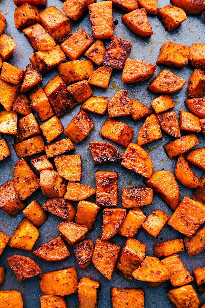 Overhead photo of tray of roasted sweet potatoes