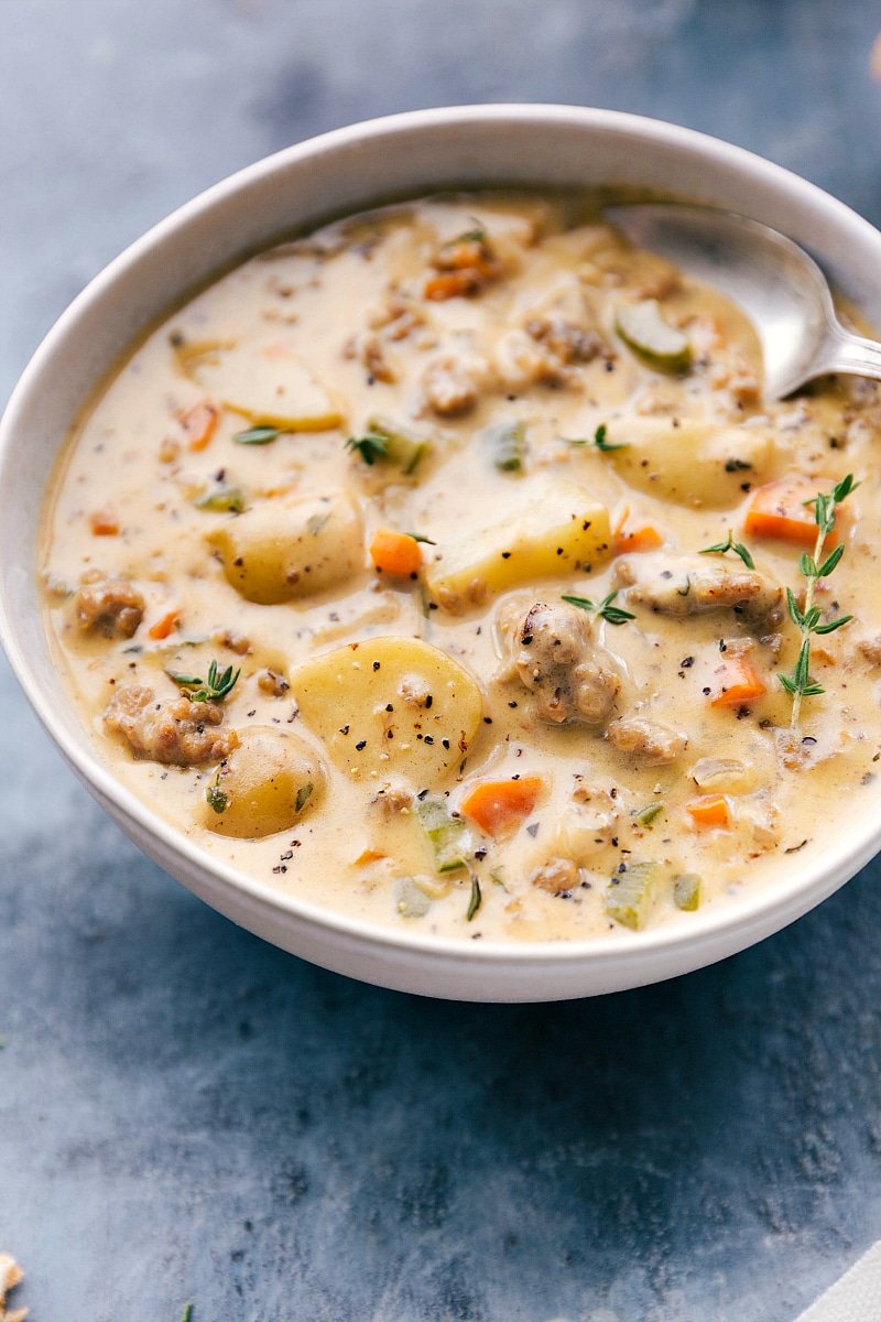 Up-close image of Sausage Potato Soup in a bowl, ready to eat.